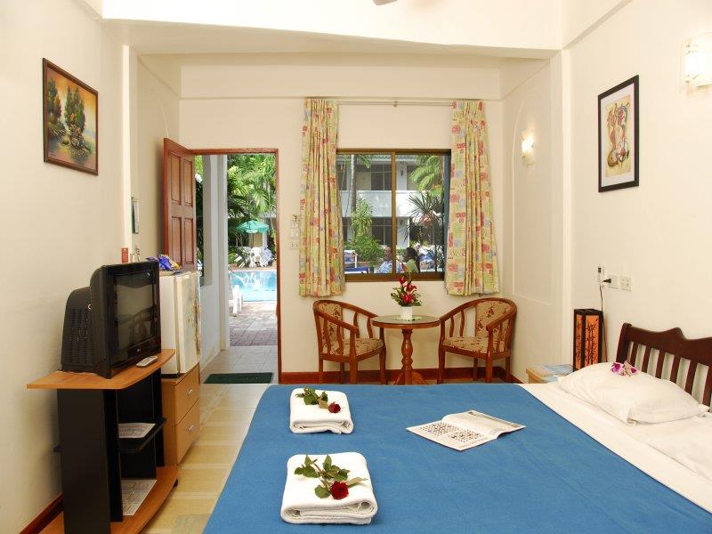 Super Deluxe with Poolside Balcony - Free WiFi access